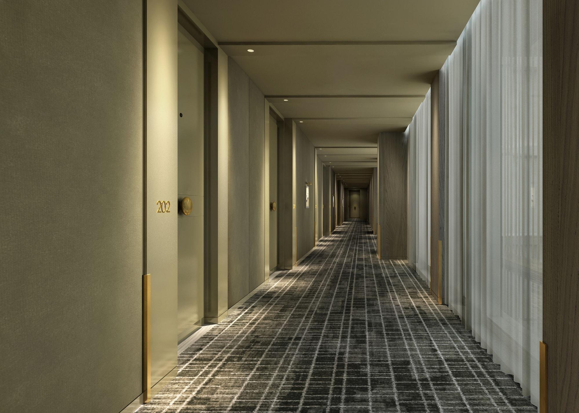 Hotel The Londoner Esterno foto A typical hotel corridor